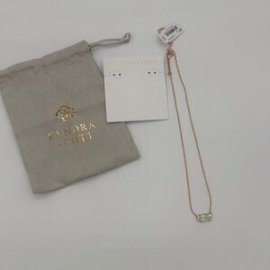 NWT Kendra Scott Ever pendant necklace in rosegold metal and dichroic glass